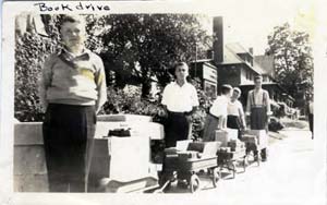 Boys collect books for the hospital